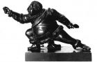 Tintatartó -  A berlini Királyi Vasöntöde mintázómestere, Wilhelm August Stilarsky (1780–1838) rajza után Friedrich Wilhelm August Castner modellőr mintázta meg Falstaff figuráját vívóállásban, (bal!) kezében karddal – íróasztalra való kisplasztika gyanánt. A feje levehető, felsőtestében porzó található, a porzótartó leemelésével pedig a tintához lehet hozzáférni. A kard kivehető a figura kezéből, és papírvágó késként levelek felnyitására lehet használni. 